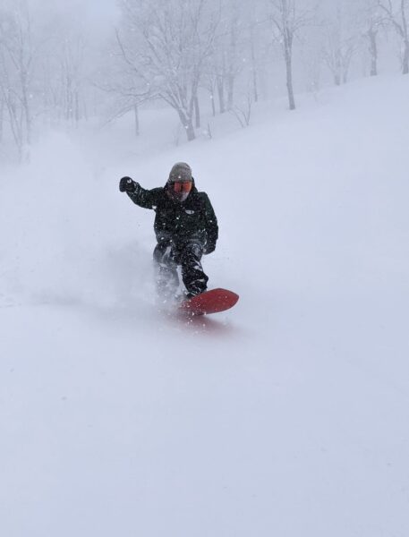 Cutting through a fresh soft snow on Mt. Kenashi
