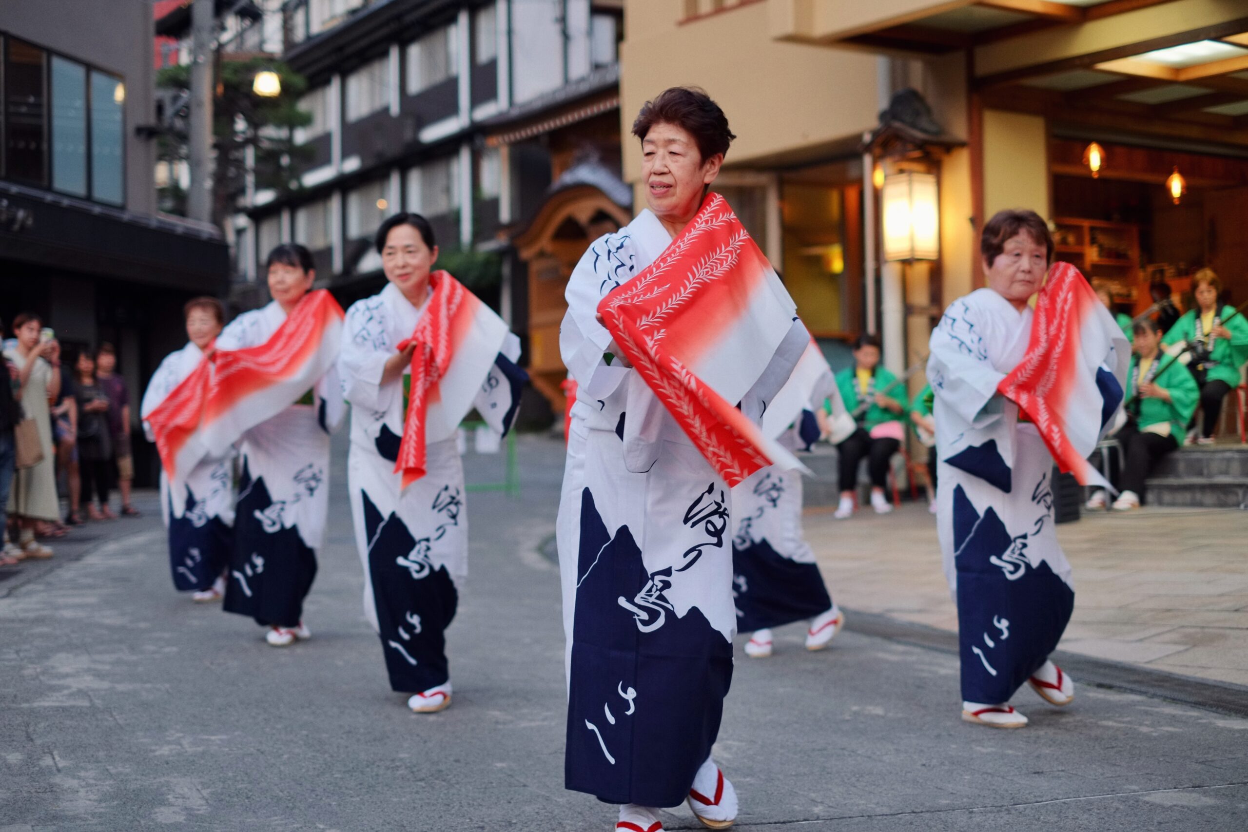 The town of Nozawa Onsen filled with people visiting for the Take no Ko bamboo festival 