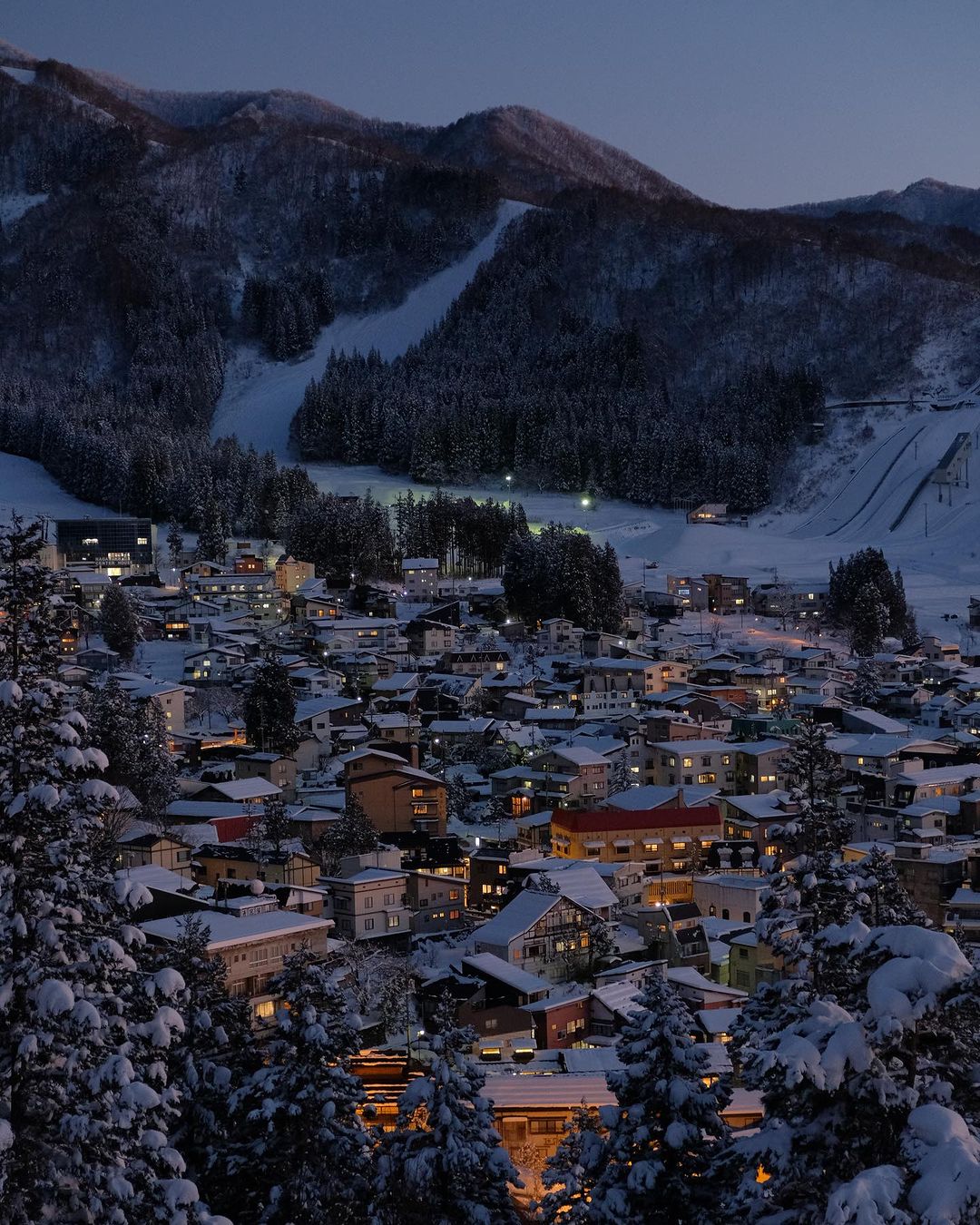 The village of Nozawa lit up in the cold winter evening 