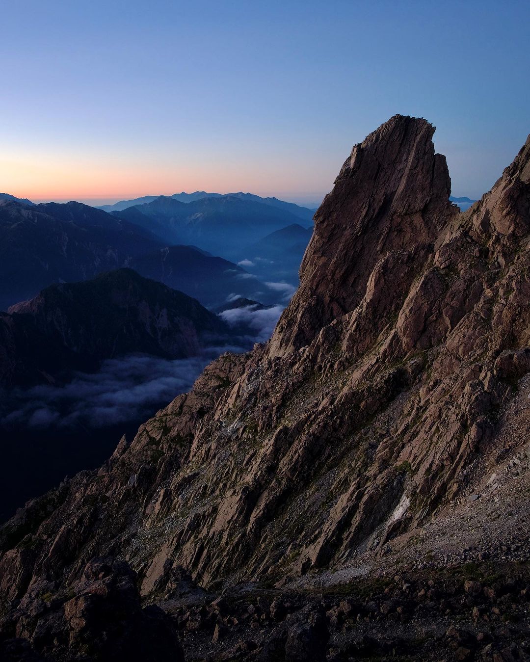 Dramatic landscape with mountain range stretching across the horizon