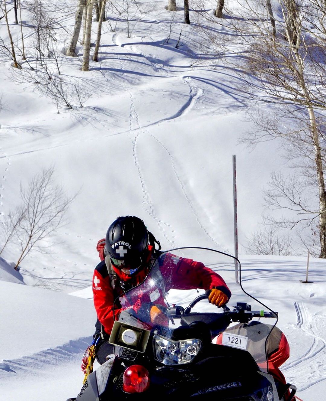 Ski mobil is the fastest way for Ski Patrol to move around the mountain in deep snow 