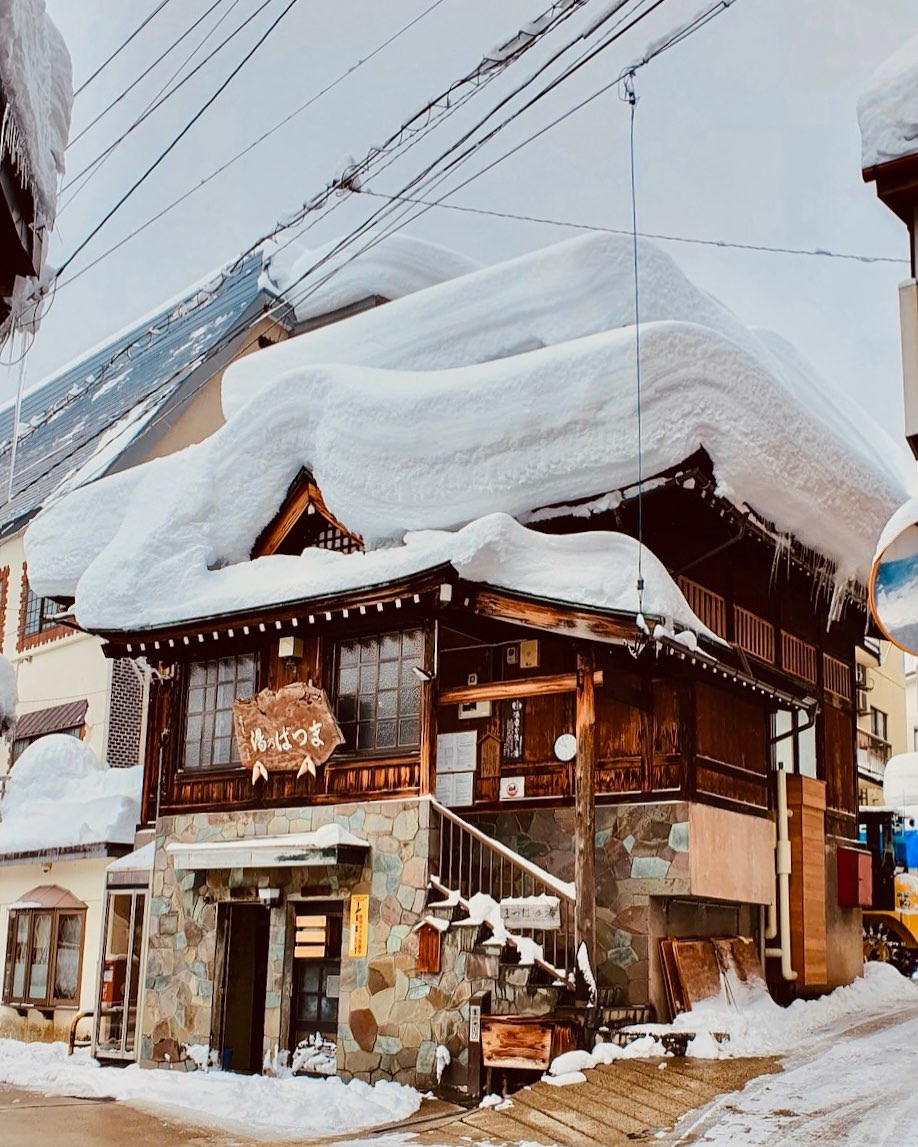 One of 13 Nozawa's onsens covered in snow