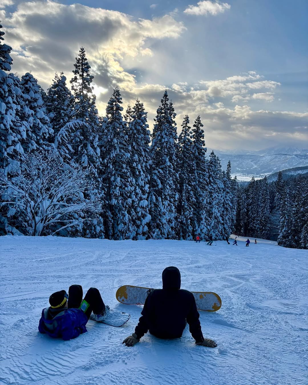 Ending the day on the slopes cruising down the forest trail 