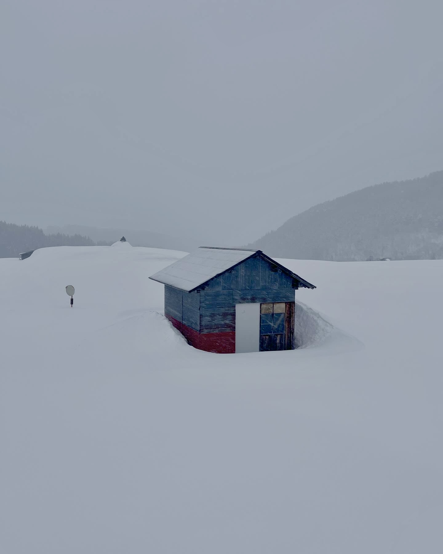 Houses down the village are almost all covered under the snow!